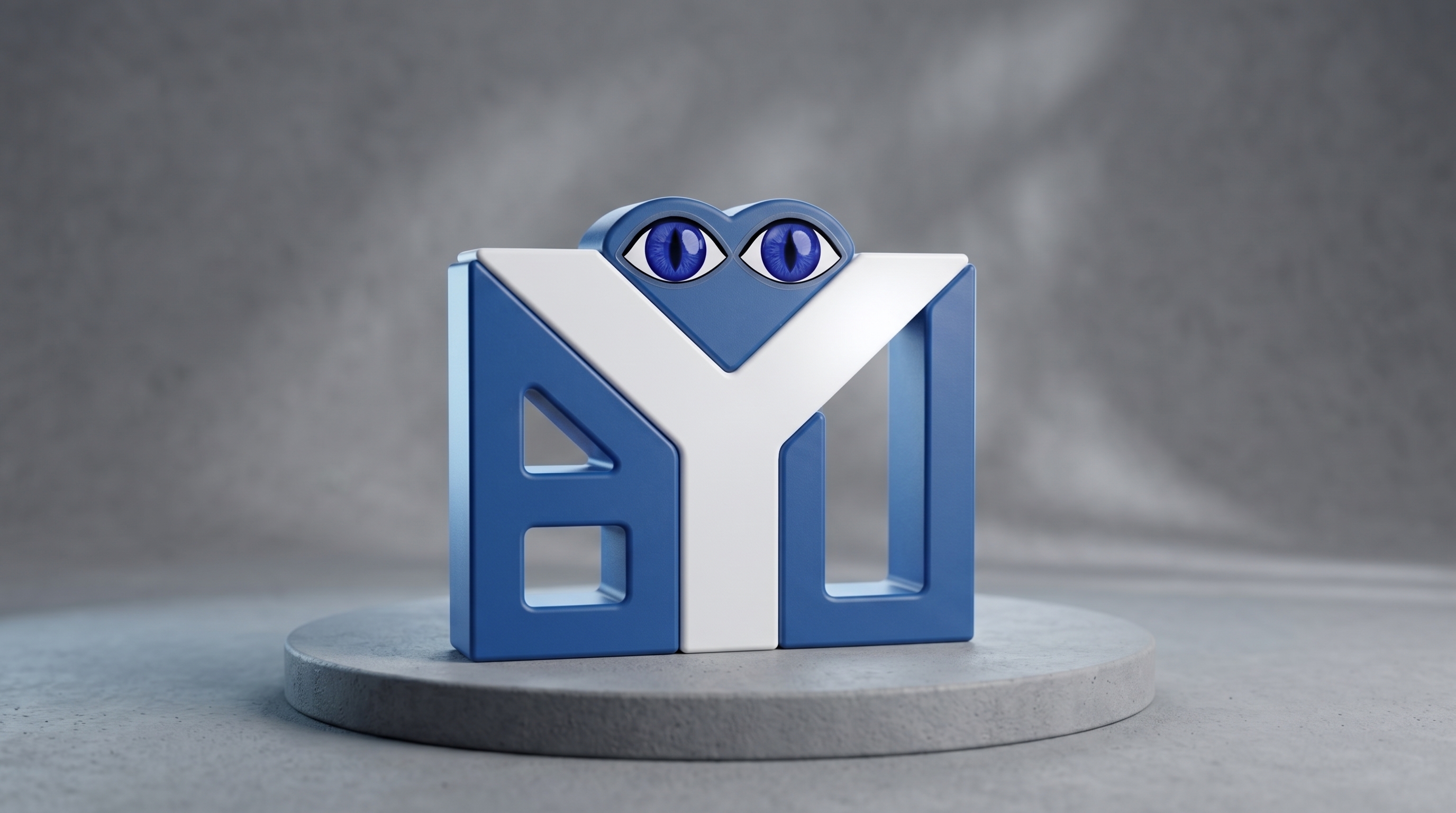 Eye Love BYU sculpture displayed on a round pedestal, showing its heart-shaped blue eyes